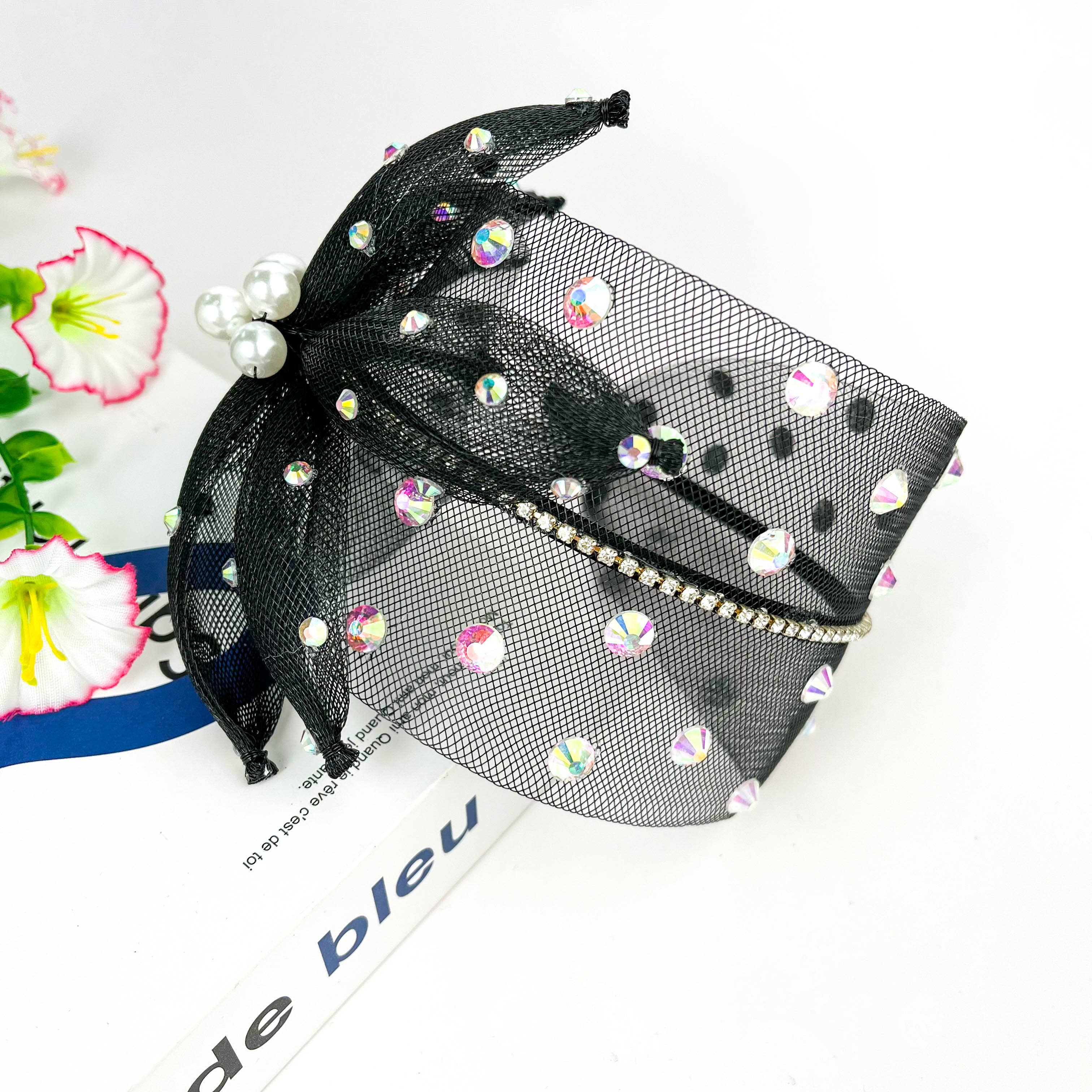 Bandeau en maille noire avec perles