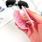 Pince à cheveux en forme de baleine