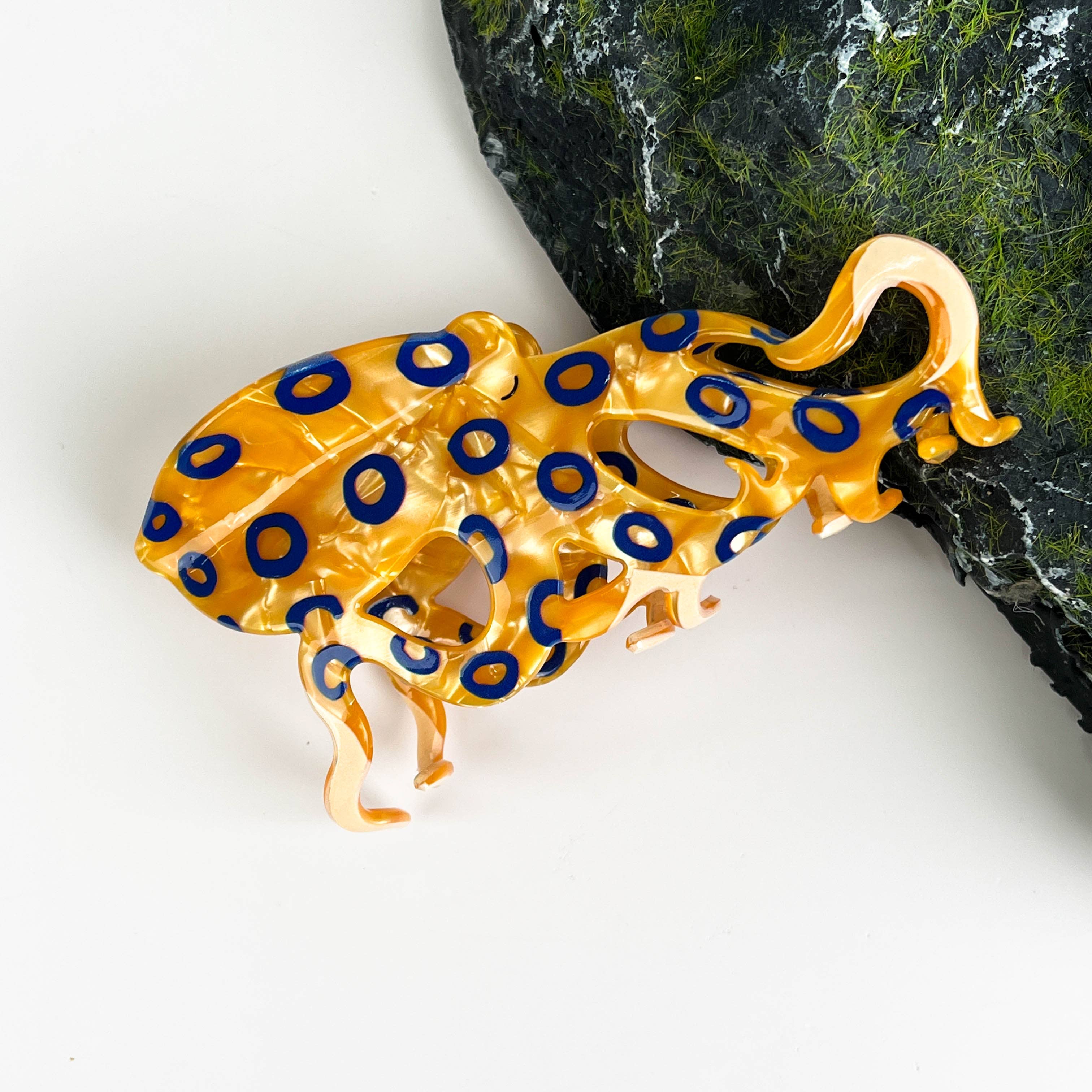 Pince à cheveux poulpe aux anneaux bleus