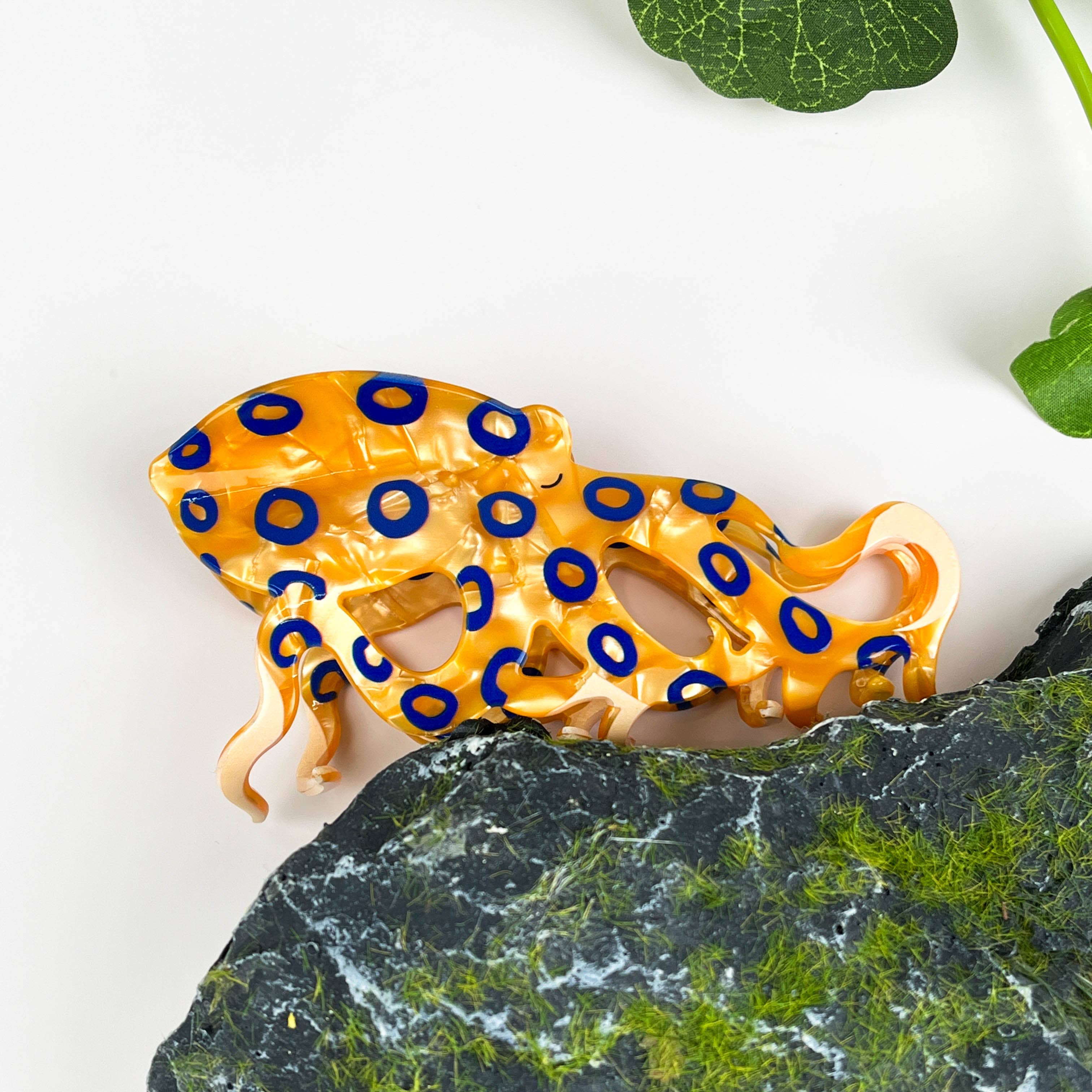 Pince à cheveux poulpe aux anneaux bleus