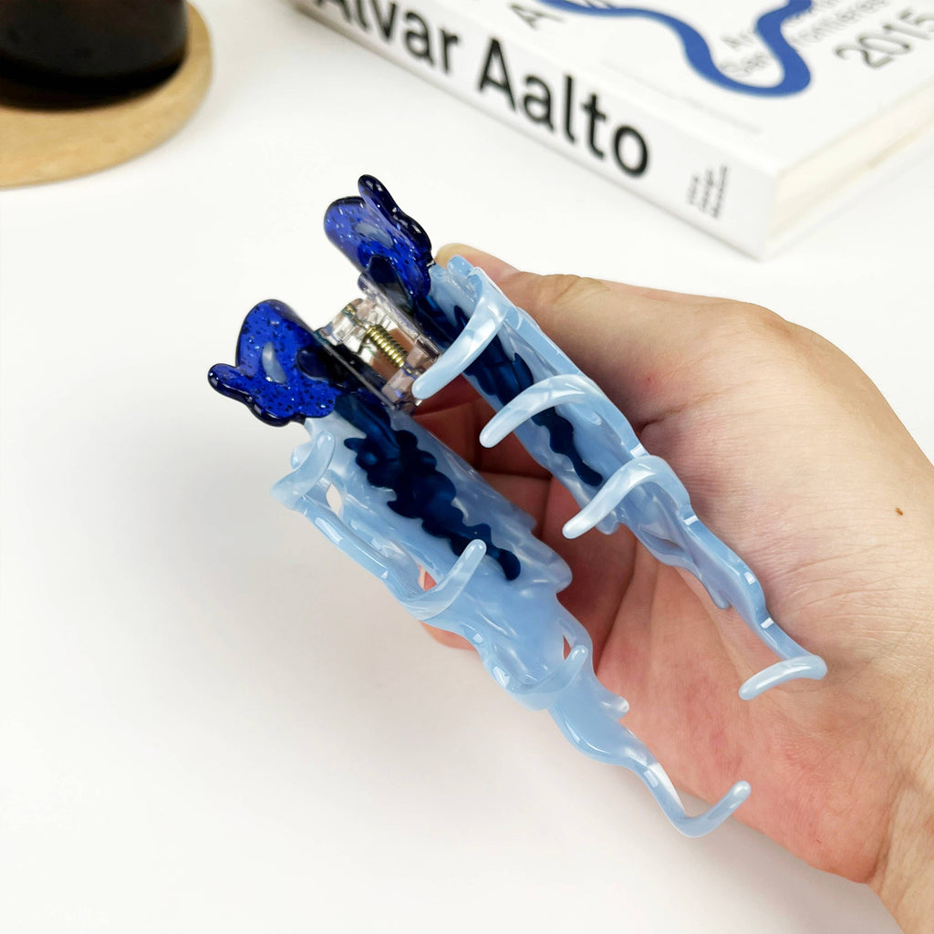 Pince à cheveux méduse bleue