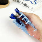 Pince à cheveux méduse bleue