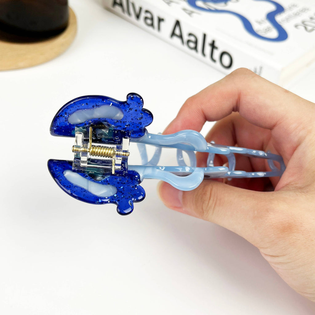 Pince à cheveux méduse bleue