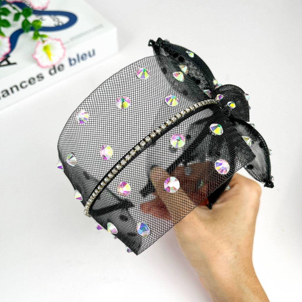 Bandeau en maille noire avec perles