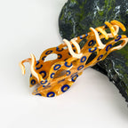 Pince à cheveux poulpe aux anneaux bleus