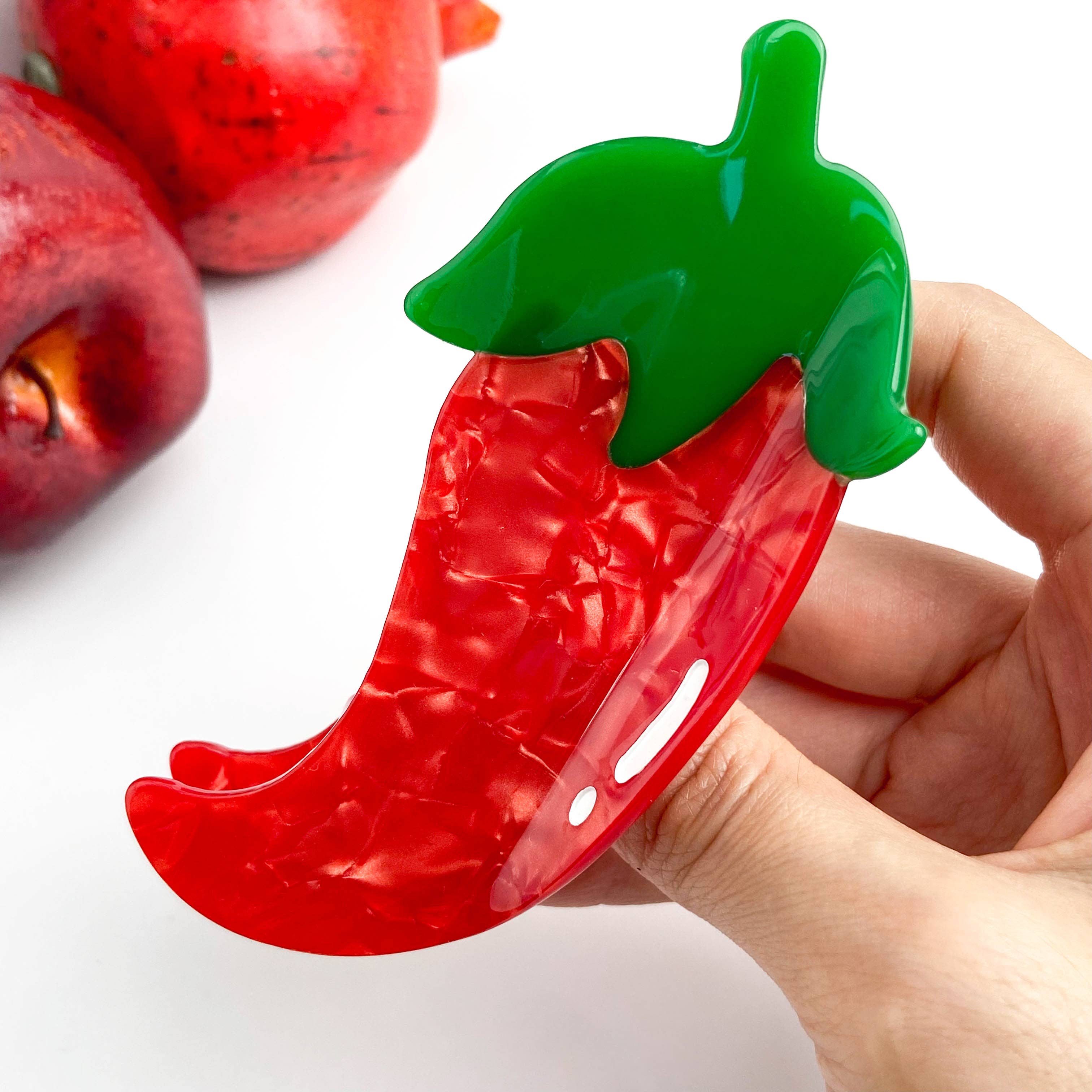 Pince à cheveux piment rouge