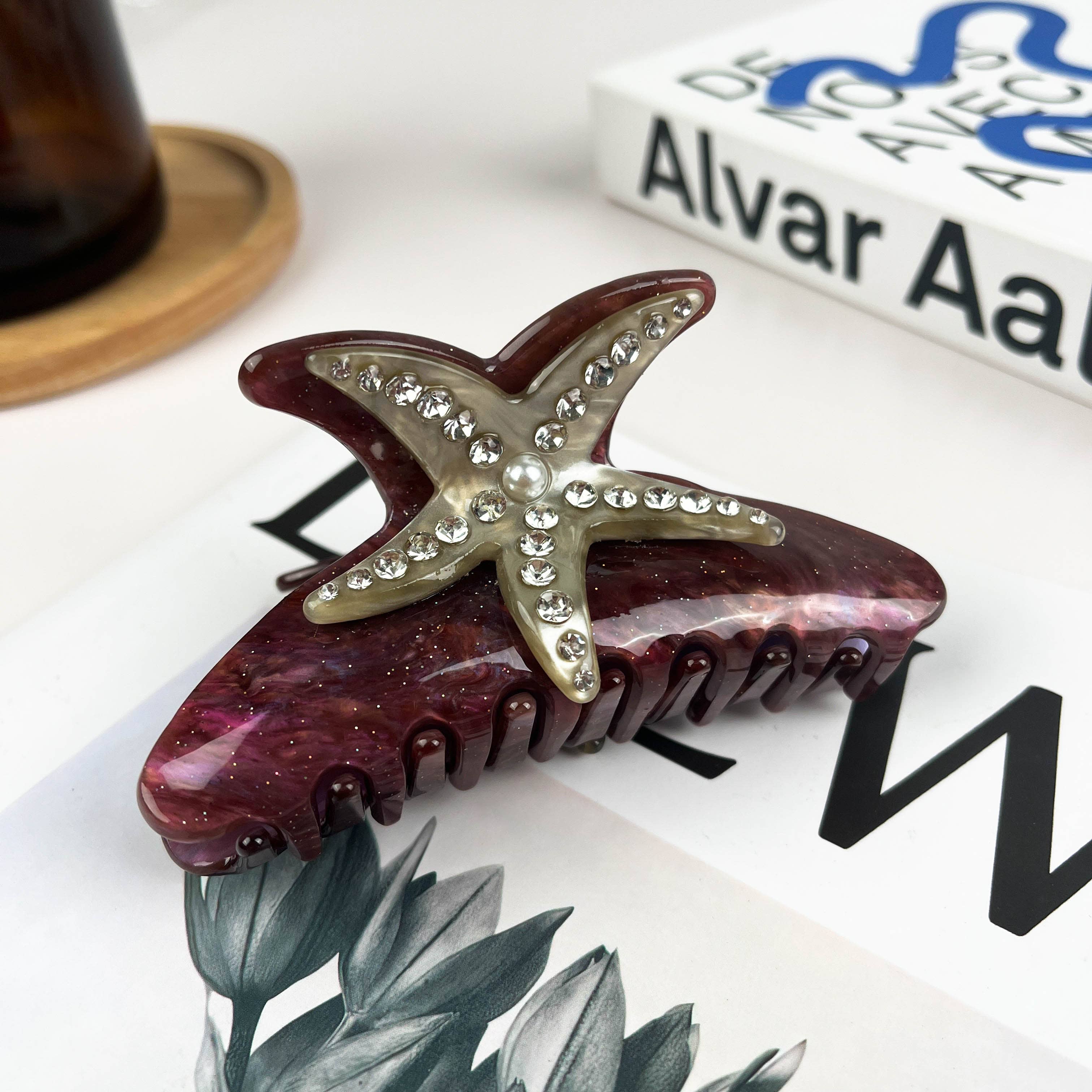 Pince à cheveux étoile de mer strass