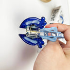 Pince à cheveux méduse bleue