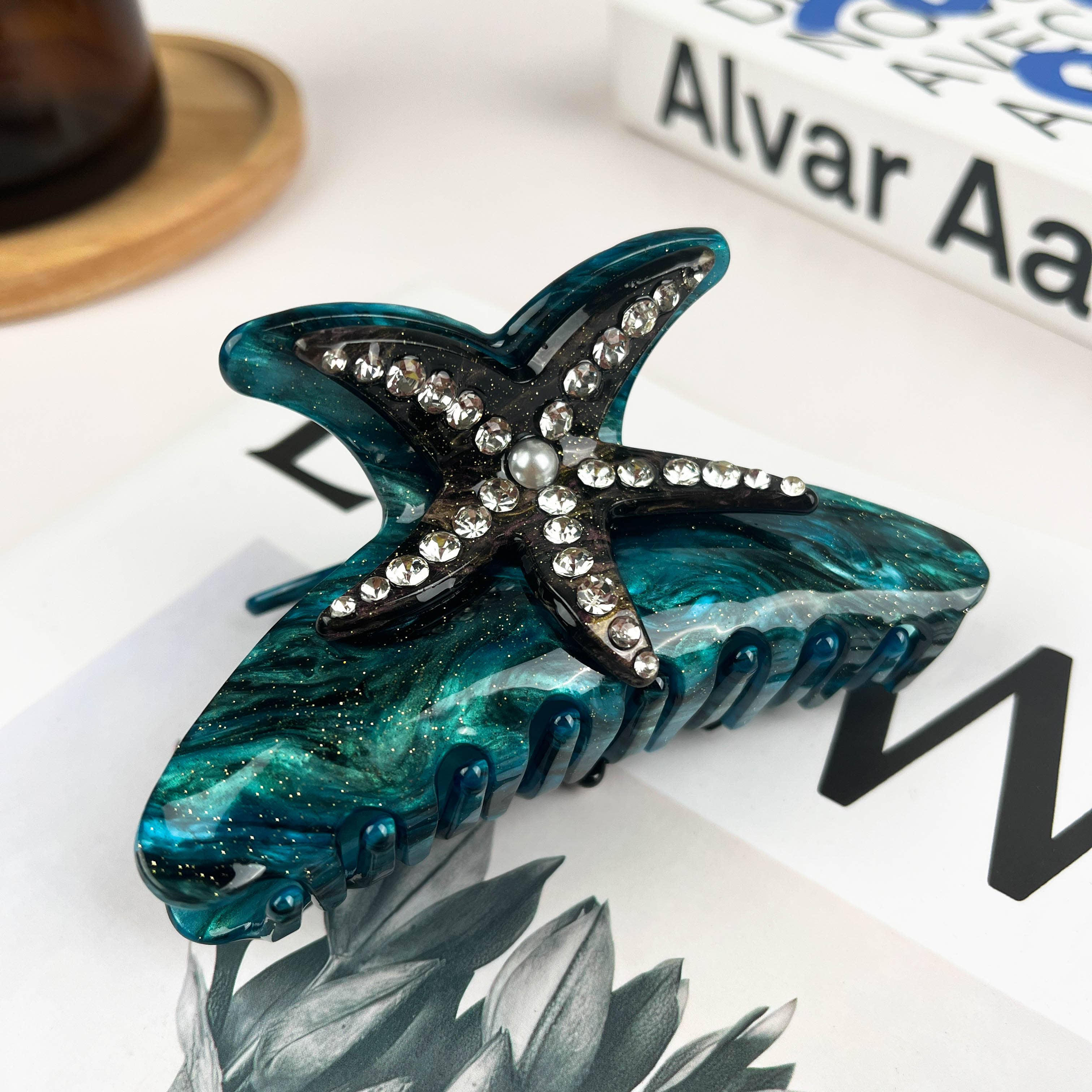 Pince à cheveux étoile de mer strass