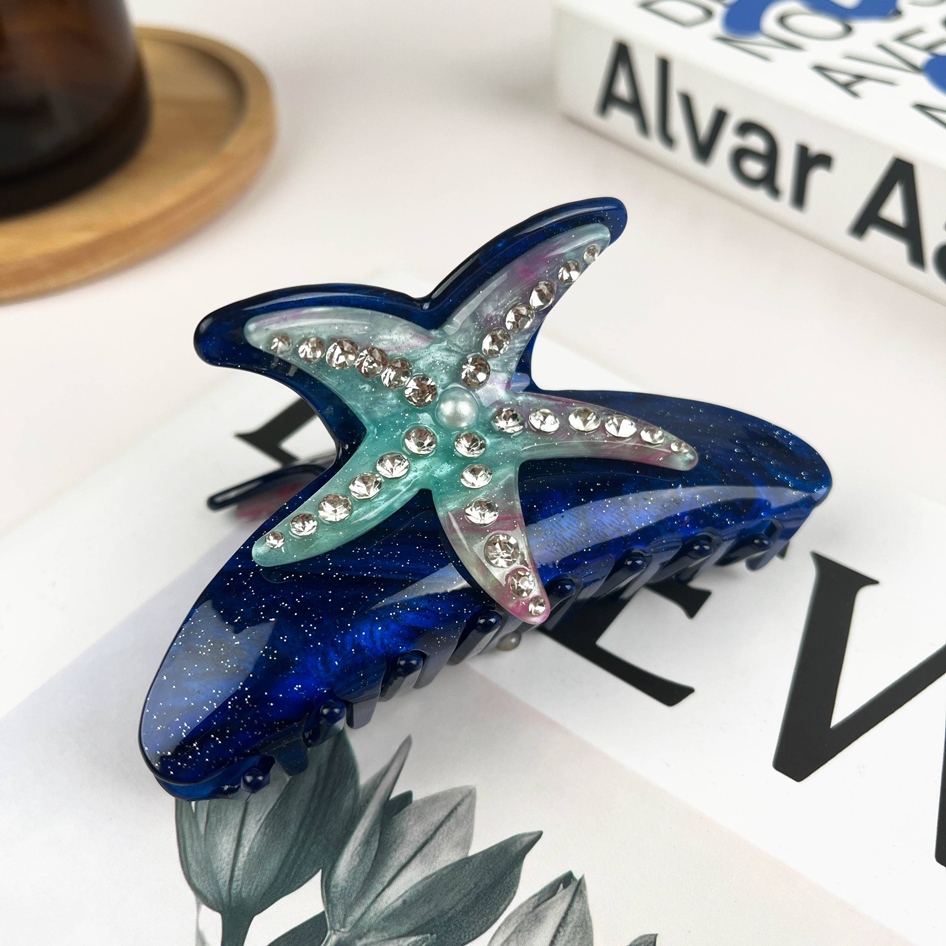 Pince à cheveux étoile de mer strass