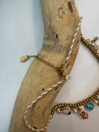 Collier grigri Flora