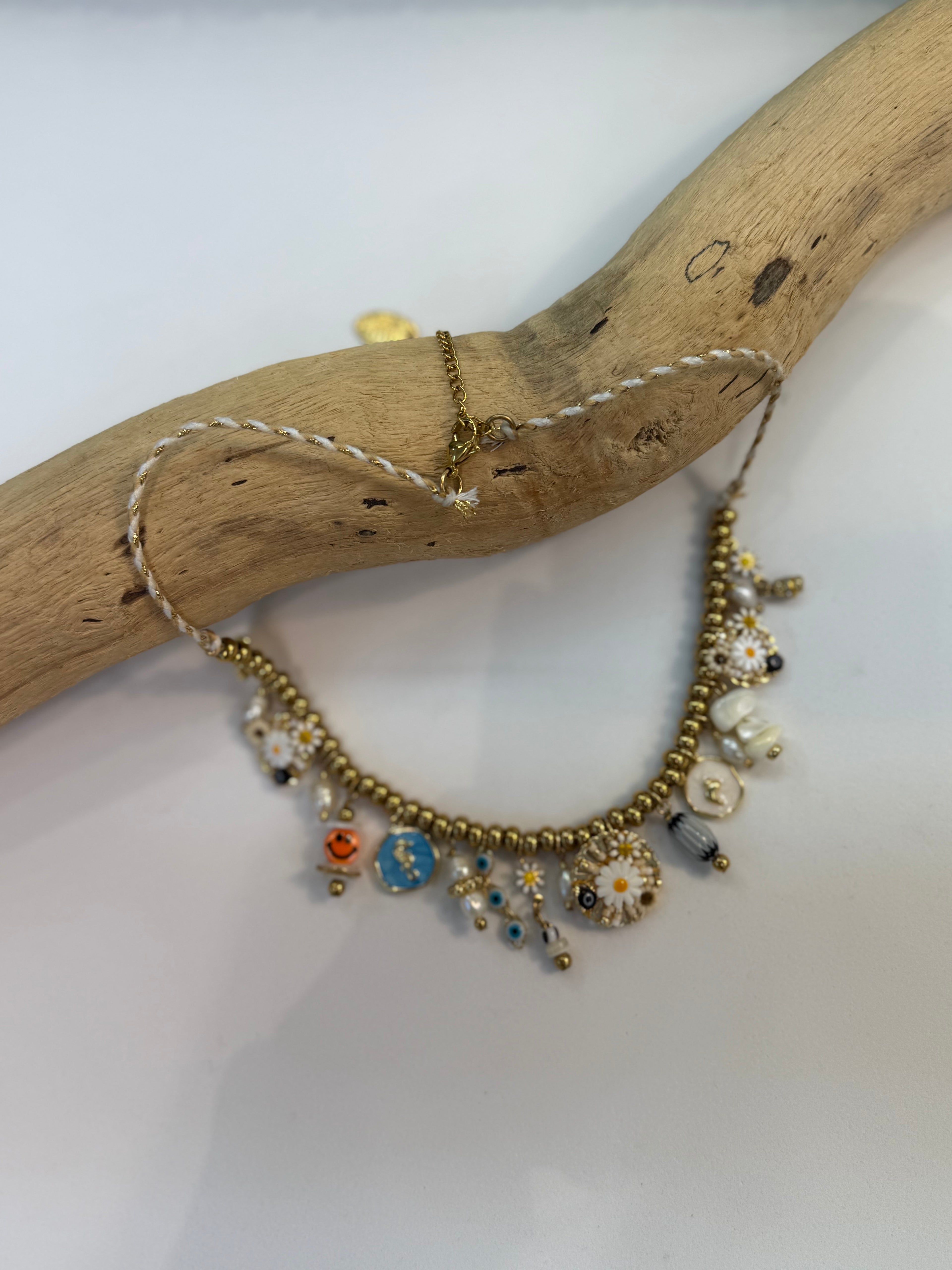 Collier grigri Flora