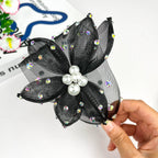 Bandeau en maille noire avec perles