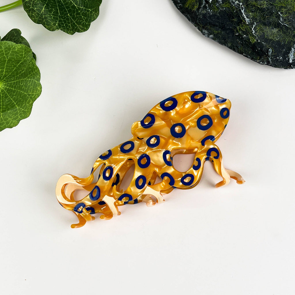 Pince à cheveux poulpe aux anneaux bleus